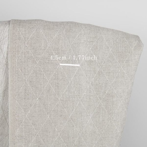Beige double-sided linen fabric in a diamond pattern with measurements