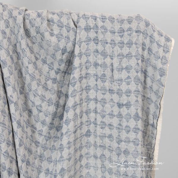 Linen cotton fabric in grey rhombus washed.
