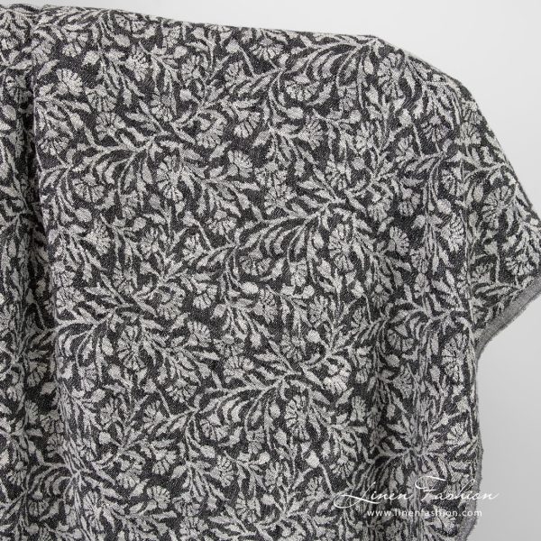 Black linen cotton jacquard fabric with flowery ornaments, washed