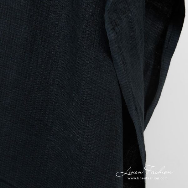 Dark blue linen fabric in twill weave and barely visible checks, specially washed