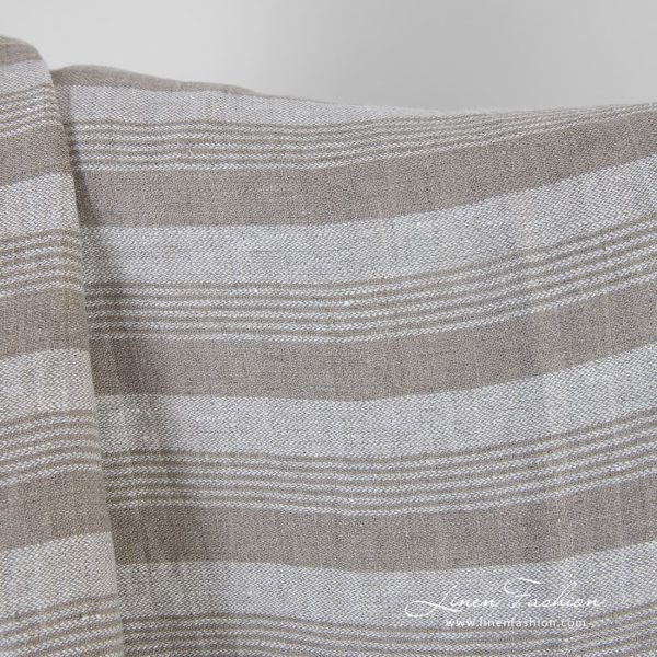Natural color linen fabric in stripes, specially washed to increase softness