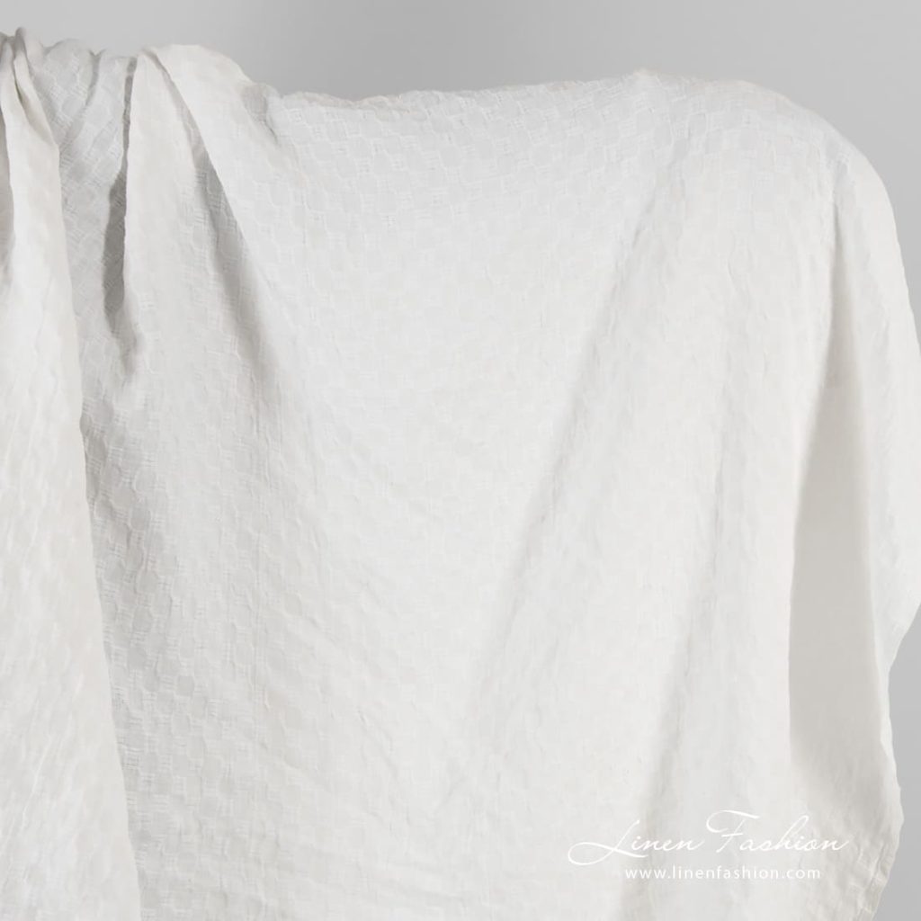 Optical white linen fabric in checks