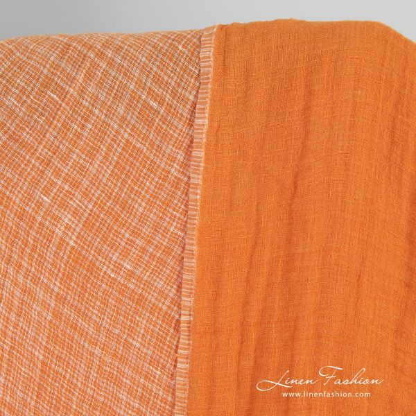 Double-sided orange linen fabric in checks, washed