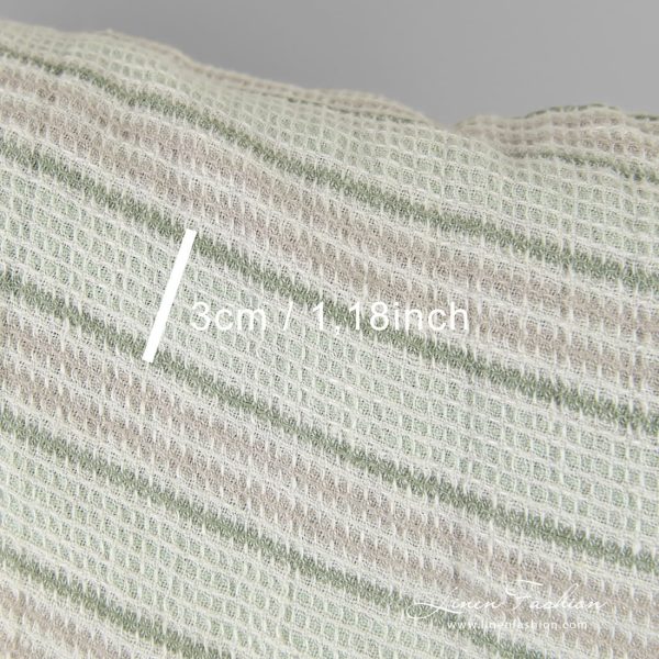 Linen fabric in horizontal stripes and waffle pattern