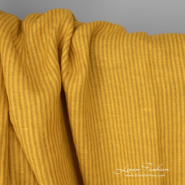 Washed linen fabric yellow colour striped close up detail