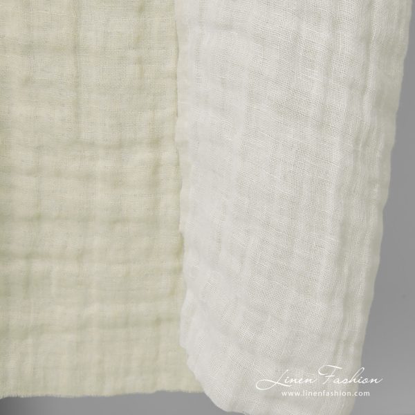 linen doublesided cream fabric, other side white.
