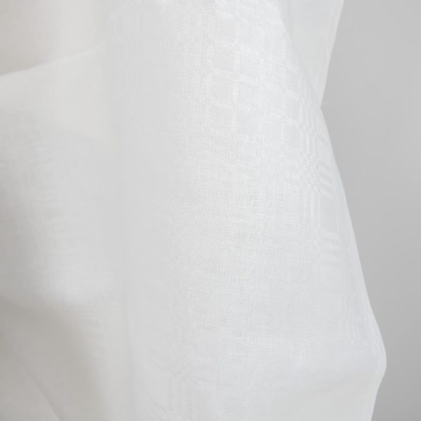 Checked off-white linen fabric close up detail