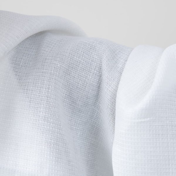 Bright white linen fabric in a small check pattern texture