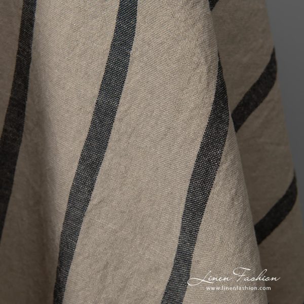 Wide washed half linen fabric natural colour black stripes close up detail