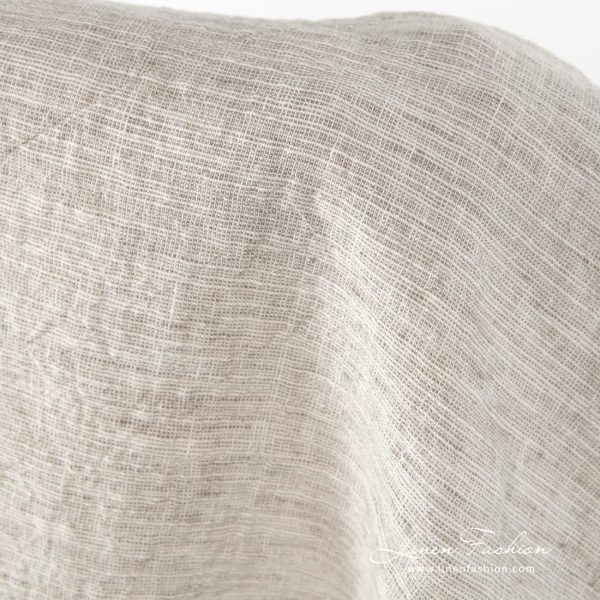 Grey-brownish wide linen-cotton fabric.