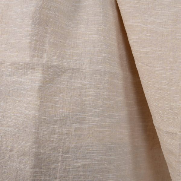 Washed linen cotton fabric yellowish pink colour close up detail