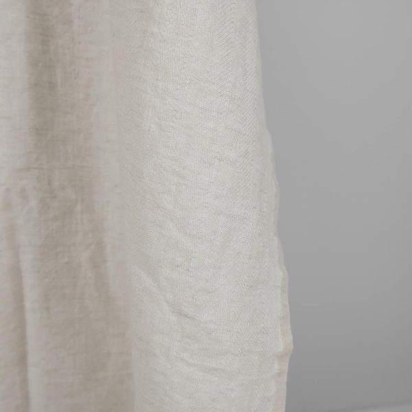Washed linen wool fabric beige in herringbone pattern edge