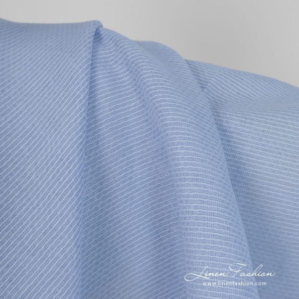 Linen cotton fabric light blue honeycomb close up detail