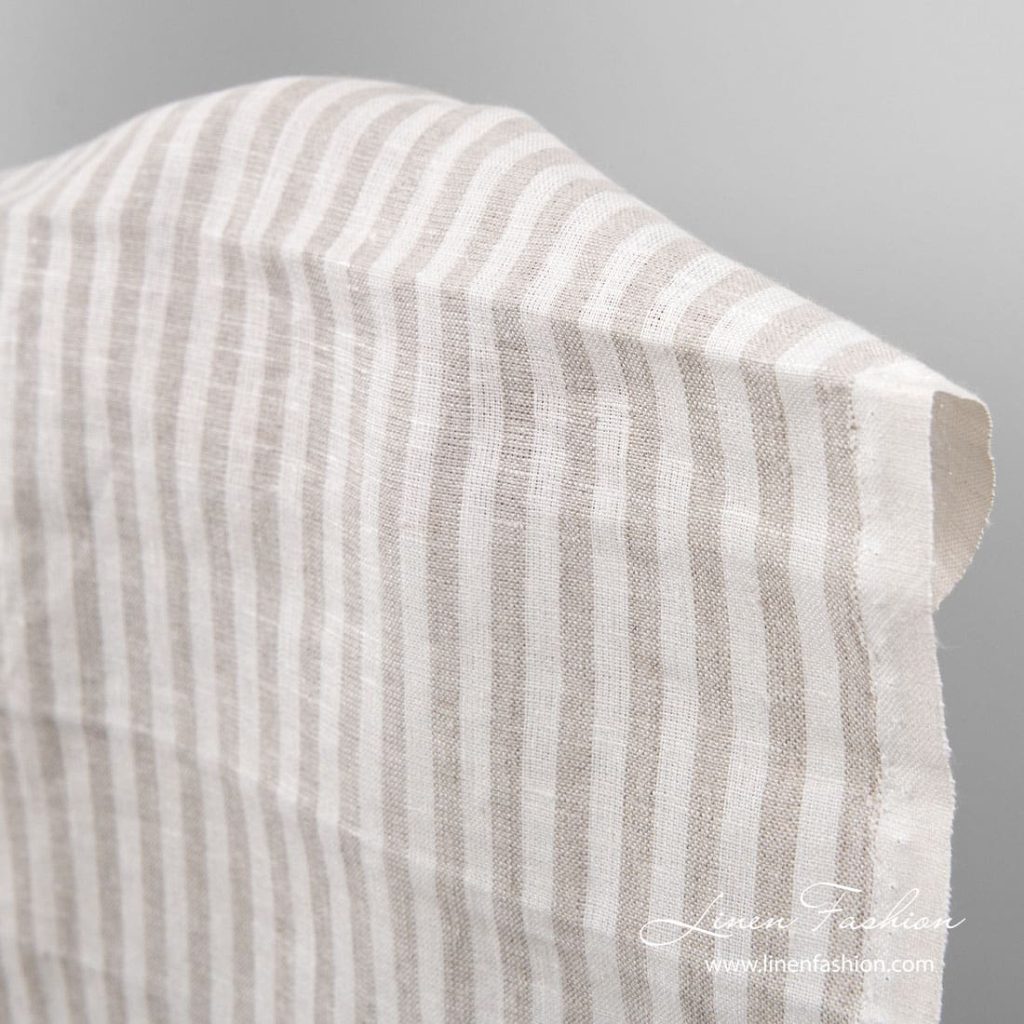 Linen fabric for tea towels in white and flax color stripes