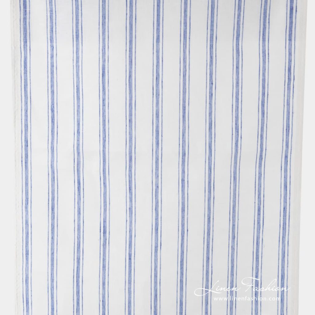 Off white narrow fabric with blue stripes.