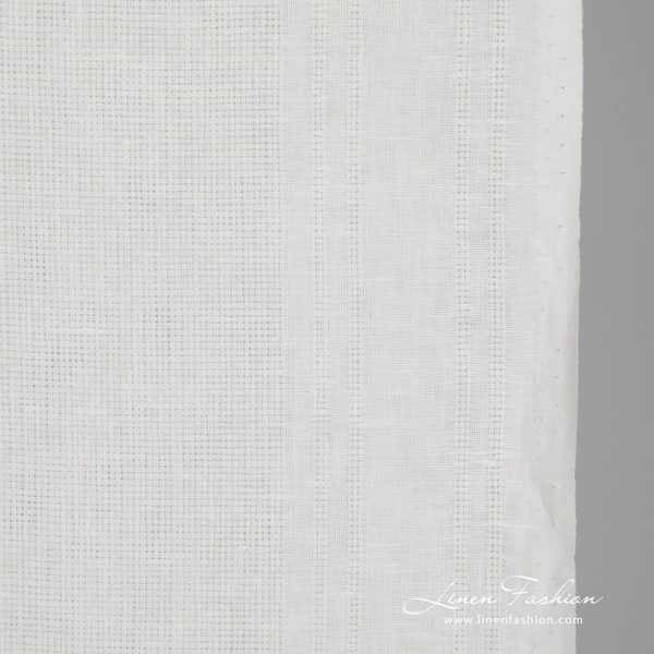 Narrow linen fabric white patterned close up detail