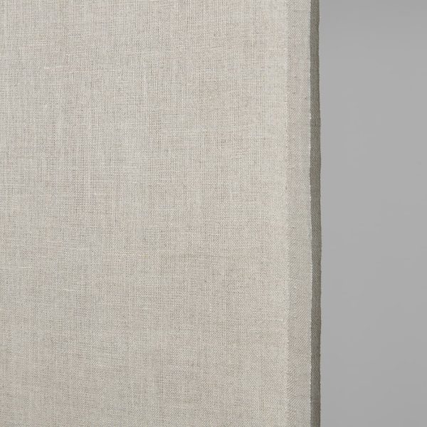 Narrow linen fabric natural beige colour close up detail