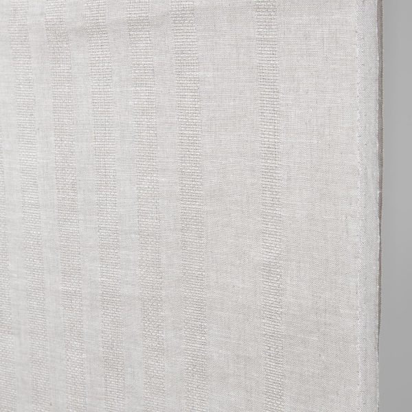 Narrow linen fabric natural and white with textured stripes close up detail