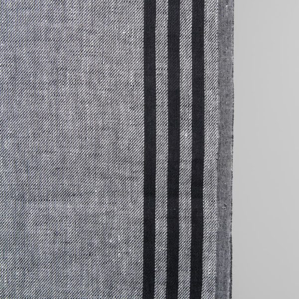 Narrow linen fabric grey with black stripes on sides close up detail