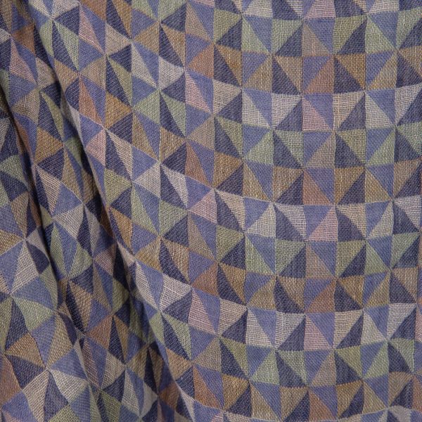Washed linen fabric in violet multicolour triangles close up detail