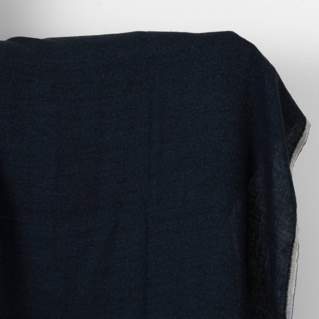 Washed linen wool fabric black with dark blue dots