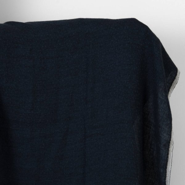 Washed linen wool fabric black with dark blue dots