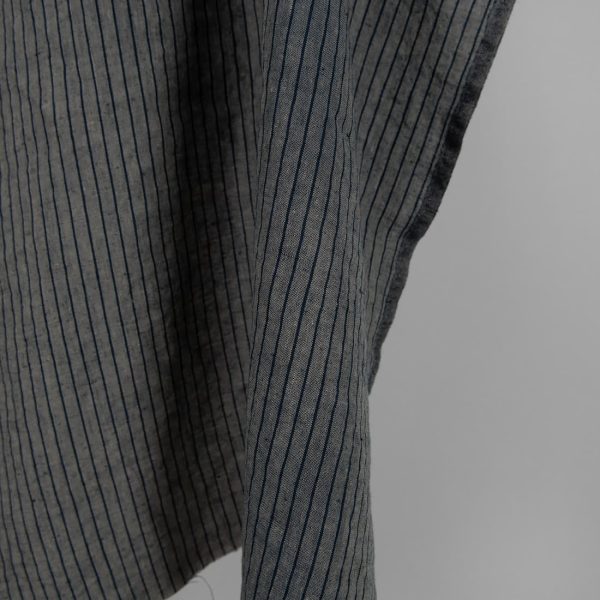 Washed linen fabric grey with thin black stripes edge