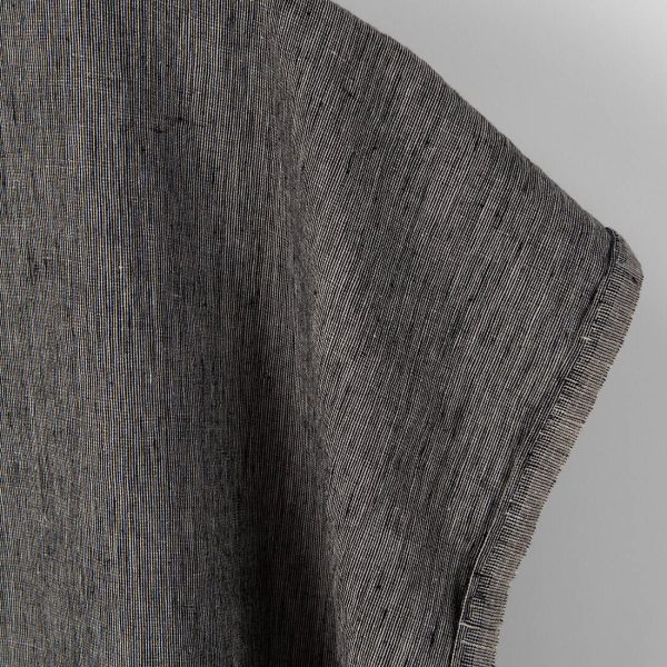 Linen fabric in natural and black, fabric edge