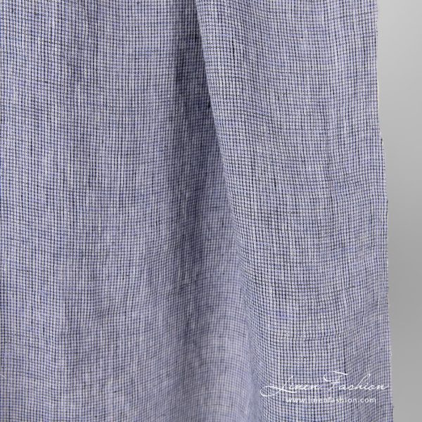 Washed 100% linen fabric in black violet checks.