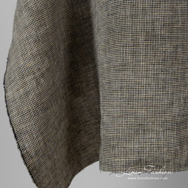 Washed 100% linen fabric in checks.