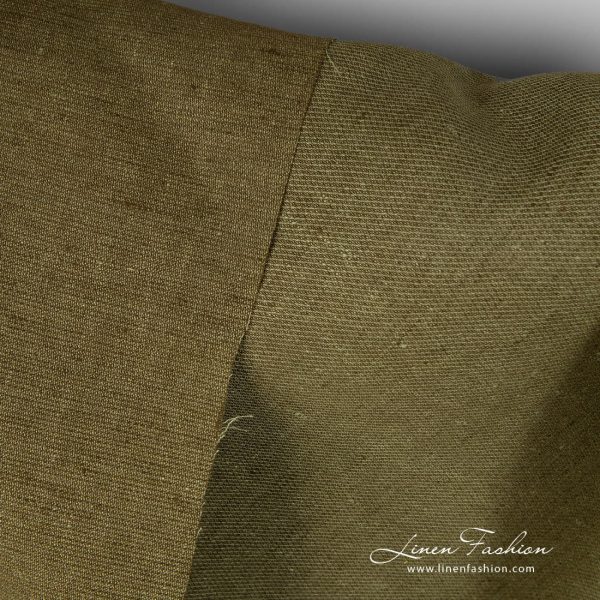 Diagonal patterned moss green linen fabric.