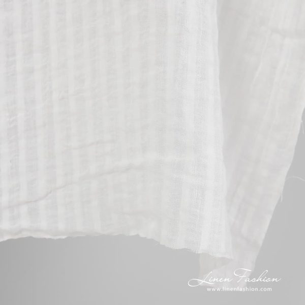 Striped 100% linen fabric in off white colour.
