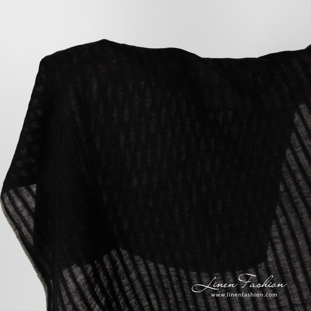 Washed black striped linen fabric.