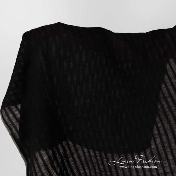 Washed black striped linen fabric.