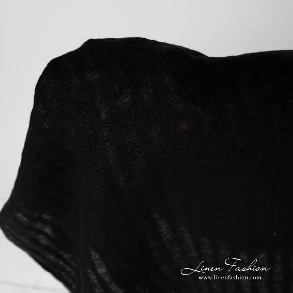 Striped black linen fabric.