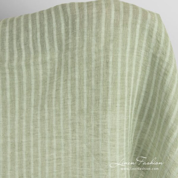 Green linen fabric in transparent stripes