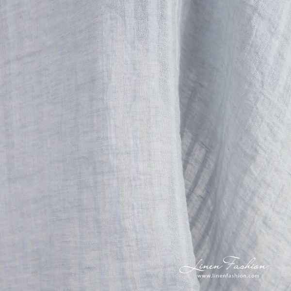 Blue linen fabric in vertical transparent stripes