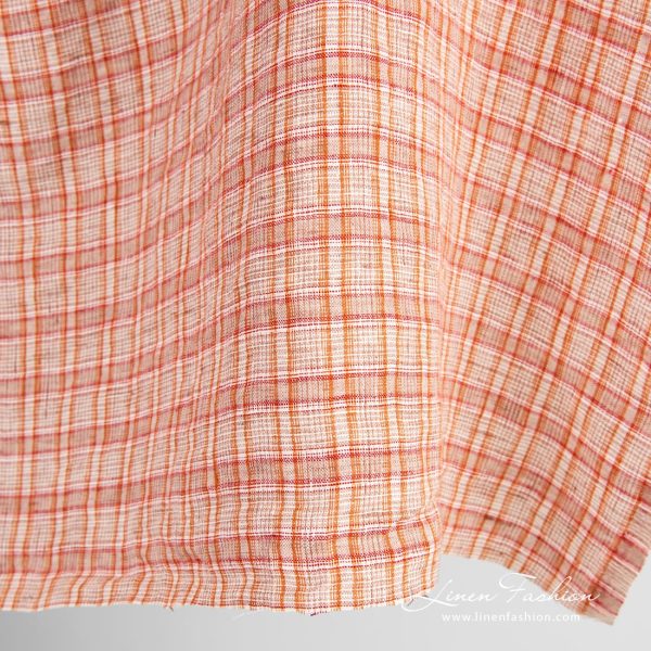 Orange linen fabric in checks, specially washed, for home textile and clothes