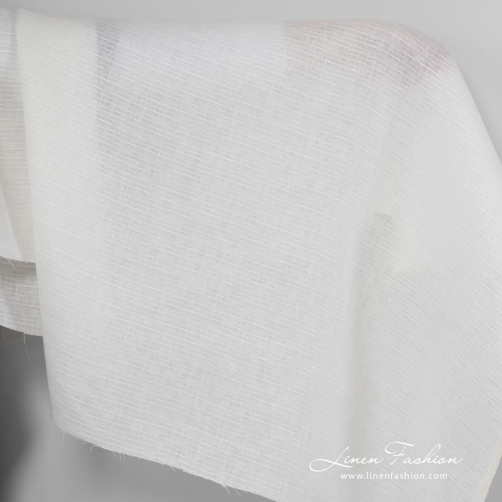 White(off-white) linen fabric.