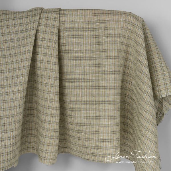 Checked linen fabric in green colour.