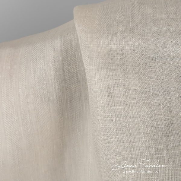 Patterned 100% linen fabric in ecru.
