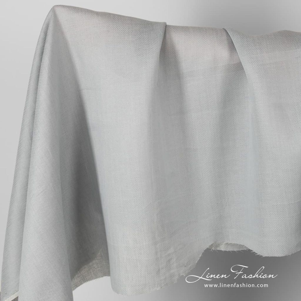 Patterned grey linen fabric.