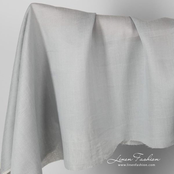 Patterned grey linen fabric.