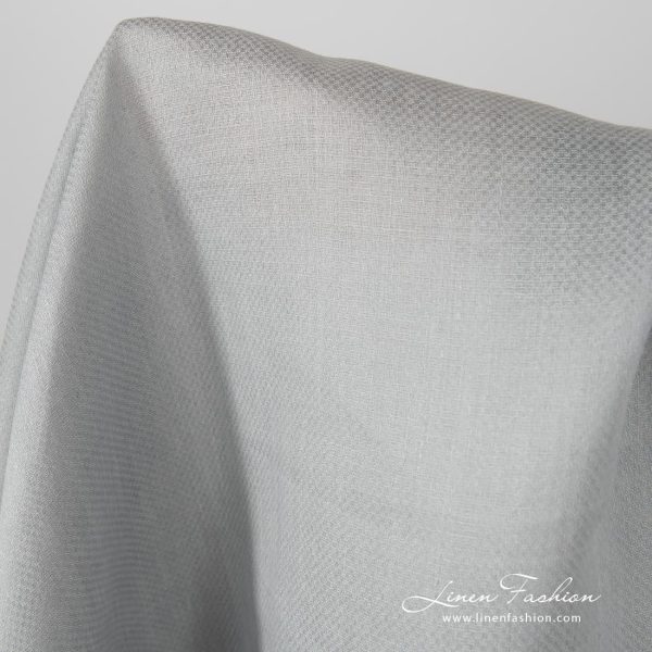 Grey coloured linen fabric, patterned.