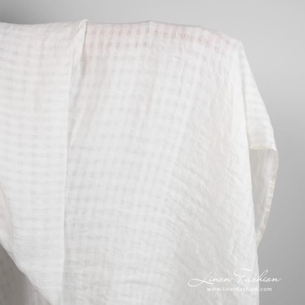 Off-white linen fabric in transparent checks