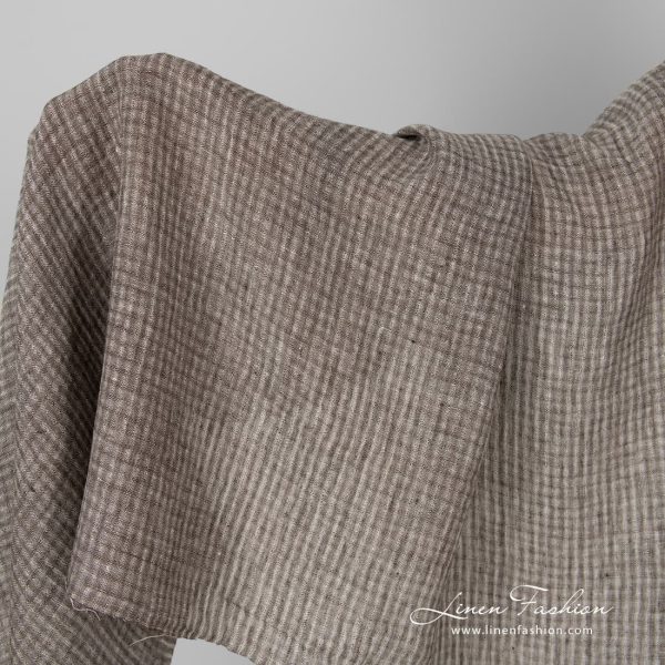 Linen fabric in brown checks, washed.