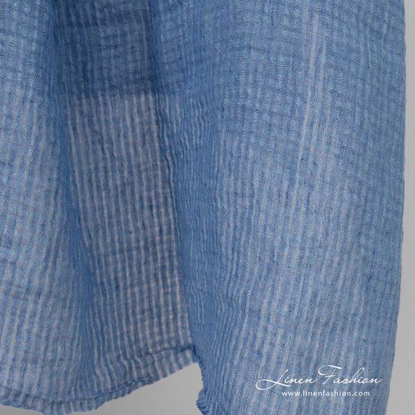Blue openweave linen fabric in tiny transparent checks