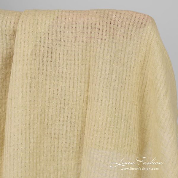 Yellow openweave linen fabric with checks