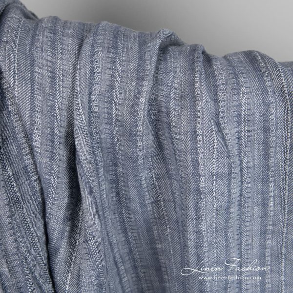 Blue grey linen fabric in vertical stripes, specially washed to increase softness