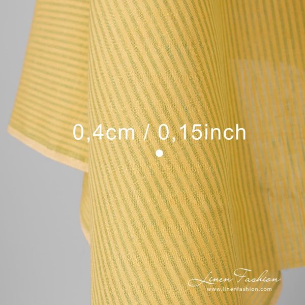 Light green and yellow striped 100% linen fabric.